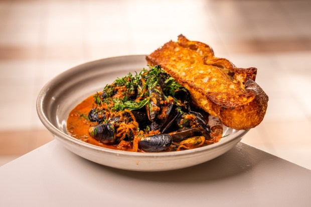 Mussels with Spanish chorizo is one of the a la carte options being served for Christmas Eve and Christmas Day at Serẽa. (Robert Reyes)