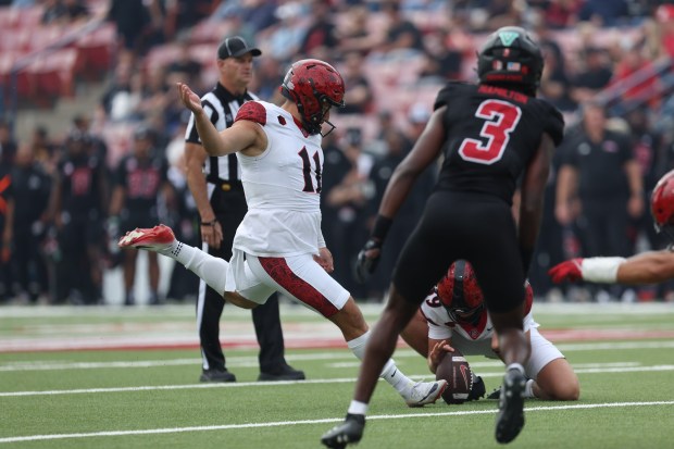 San Diego State's Gabe Plascencia kicks a 50-yard field goal before halftime during Saturday's game against Fresno State in Fresno. (Justin Truong, SDSU athletics)