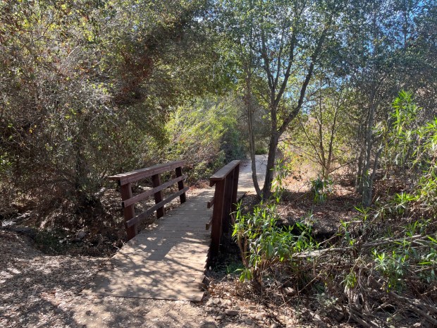The trail through Tecolote Canyon crosses several wooden bridges.