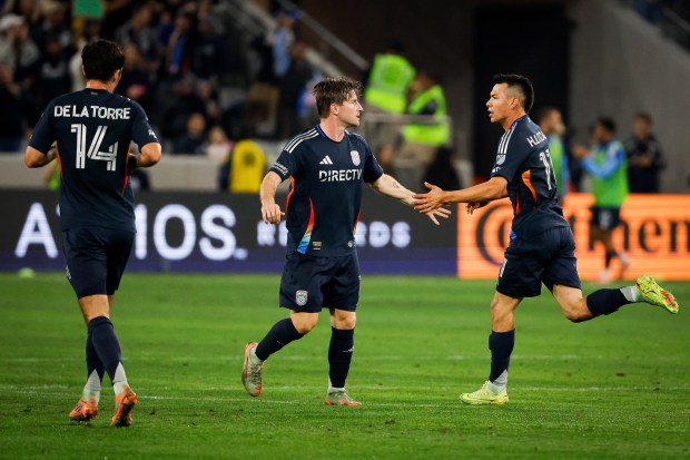 SDFC's Anders Dreyer (left) congratulates Hirving "Chucky" Lozano after his goal against the Vancouver Whitecaps on Saturday night. (Meg McLaughlin / The San Diego Union-Tribune)