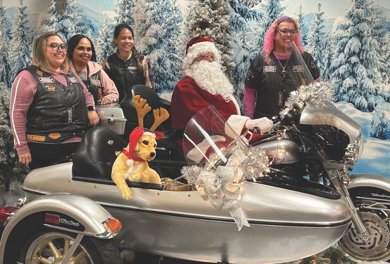 Caliente Harley-Davidson is offering pics taken with a Hog-riding Santa.
