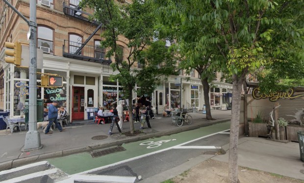 Dean Conover Whetzel hit his head on the pavement after is neighbor, Dana Escoffier, allegedly knocked him to the ground on Hudson St. near W. 10th St., just around the corner from the apartment building where both men lived, on Oct. 11, cops said. (Google)