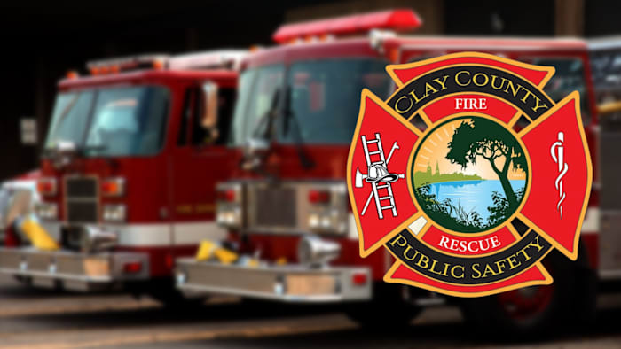 Clay County Fire Rescue working on house fire in Lake Asbury area