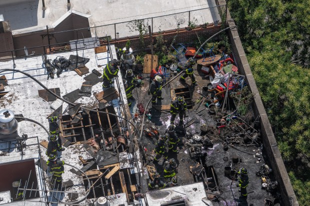 FDNY fire fighters work a fire at 305 E. 95th St. Friday, August 15, 2025 in Manhattan, New York. (Barry Williams/ New York Daily News)