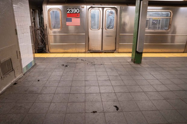 Remnants of burnt cloth are pictured at the Times Square station after a homeless man was set on fire while sleeping on an uptown No. 3 subway train early Monday.