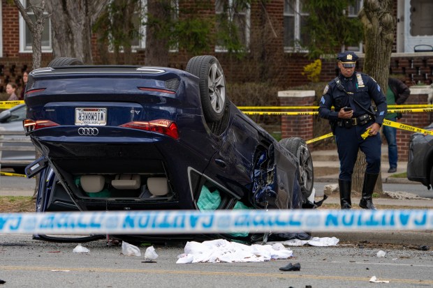 Several people were killed, including children, after a blue Audi vehicle collided with a silver Toyota Camry Livery Cab, before striking several pedestrians and overturning, on Ocean Parkway near Quentin Road in Brooklyn on Saturday March 29, 2025. 1459. (Theodore Parisienne / New York Daily News)