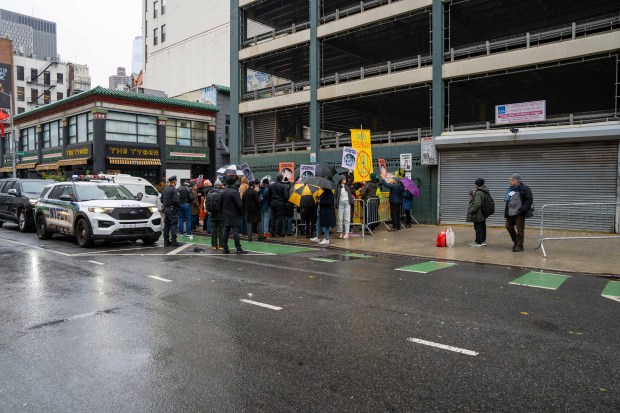 Elected officials and immigration advocates hold a rally Sunday outside a lower Manhattan parking garage where protesters were arrested for blocking a planned ICE operation. 