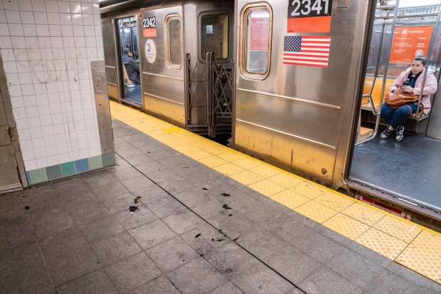 Remnants of burnt cloth are pictured after a homeless man was set on fire while sleeping on an uptown No. 3 subway train approaching the Times Square stop in Manhattan early Monday, Dec. 1, 2025. (Theodore Parisienne / New York Daily News)