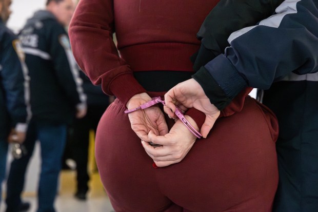 Autumn Valeri being led into the courtroom for her indictment for a deed fraud scam at Queens Supreme Court in Brooklyn, Tuesday, March 18, 2025. (Shawn Inglima/New York Daily News)