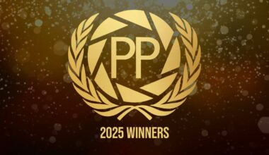Gold laurel wreath around geometric design with the letters "PP" in the center, above the text "2025 WINNERS," on a sparkling, festive background.