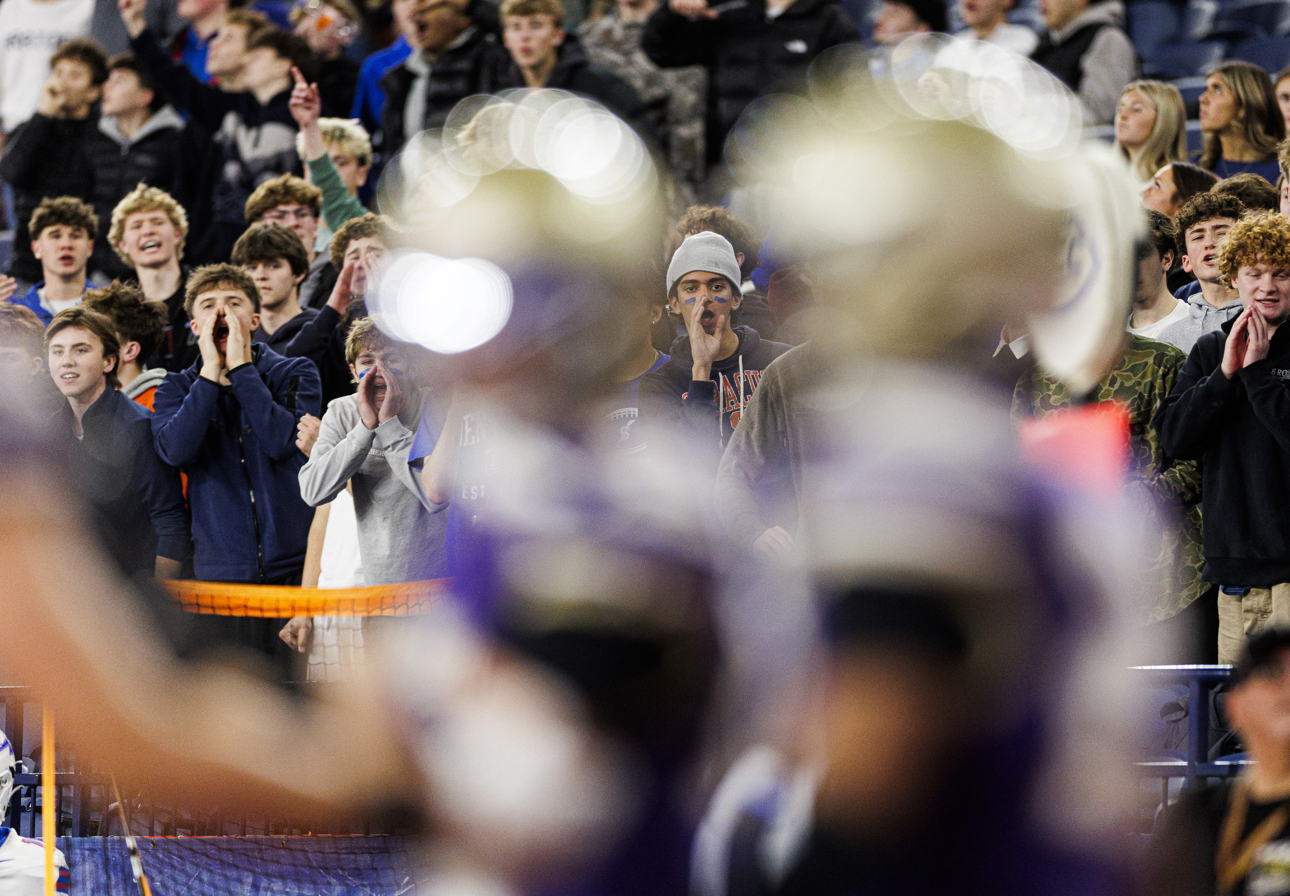 Saratoga Springs fans boo CBA players after demanding a call against them for interfering with the receiver that isn’t called as the CBA Brothers and Saratoga Springs Blue Streaks fought for the New York State Class AA state title at JMA Wireless Dome Saturday, December 6, 2025. (N. Scott Trimble | strimble@syracuse.com)