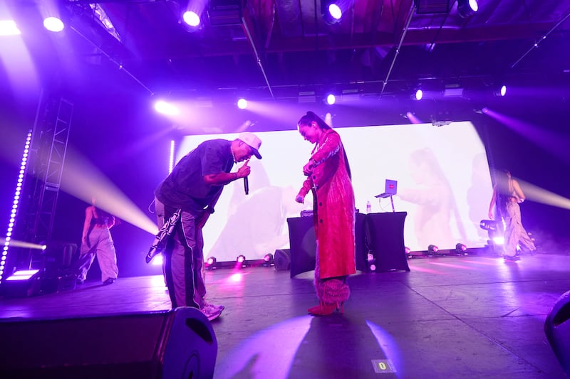 Artist perform with colorful lights