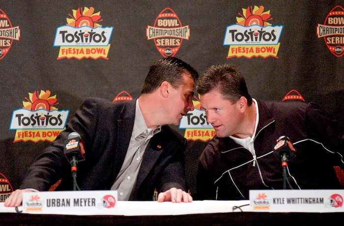 (Trent Nelson | The Salt Lake Tribune) Urban Meyer, left, and Kyle Whittingham speak at a press conference before the Fiesta Bowl in 2004.