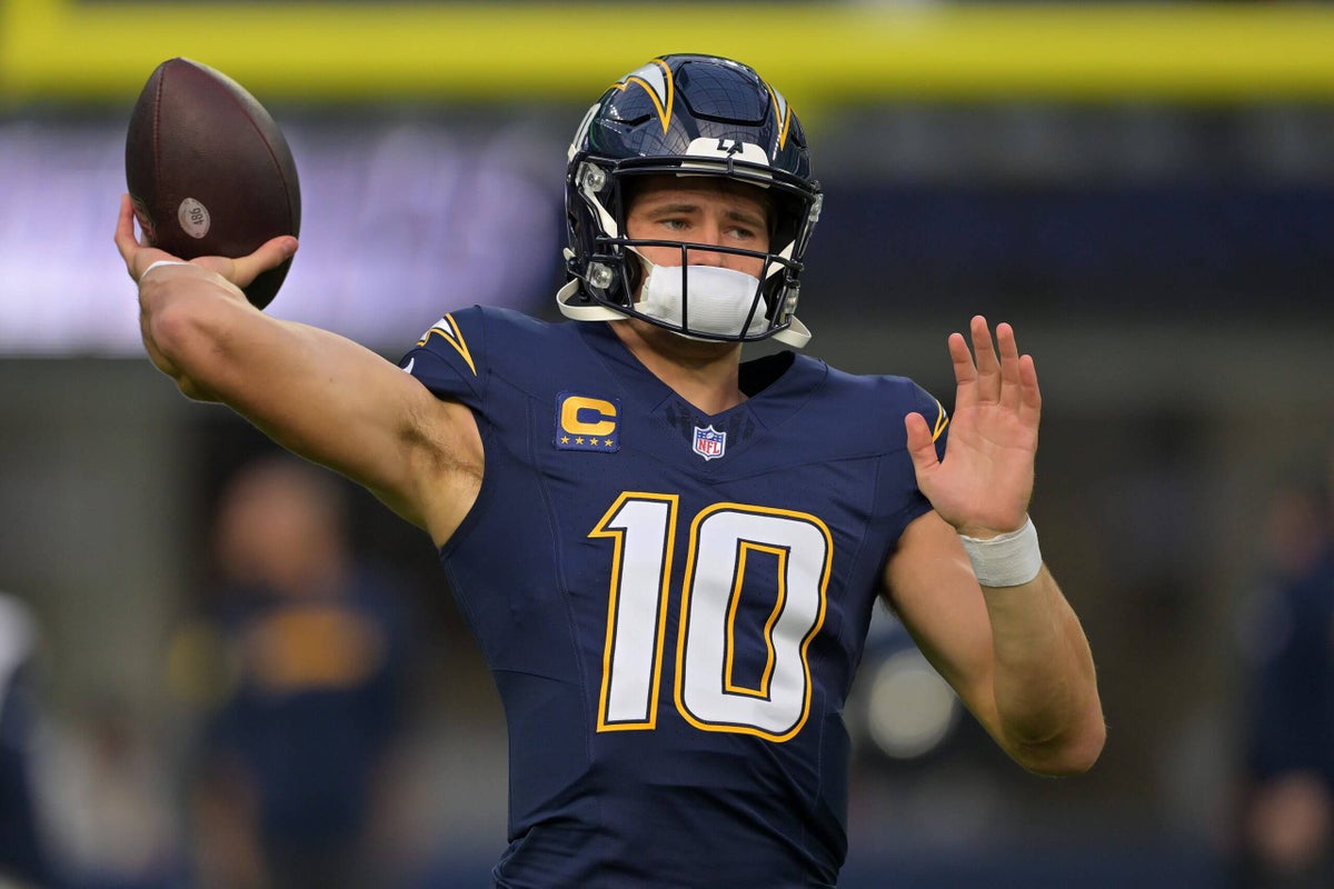 Chargers’ Justin Herbert suffers broken bone in left hand, hopes to play vs. Eagles