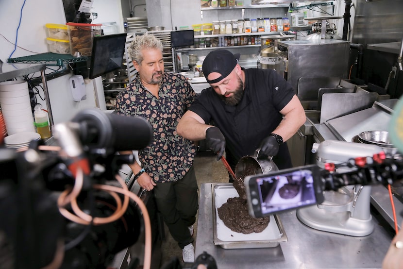 Food Network celebrity Guy Fieri cooked with Dallas chef Taylor Rause for an episode of...