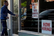 A hiring sign is displayed at a restaurant in Northbrook, Ill., Sunday, Oct. 27, 2024. (AP...