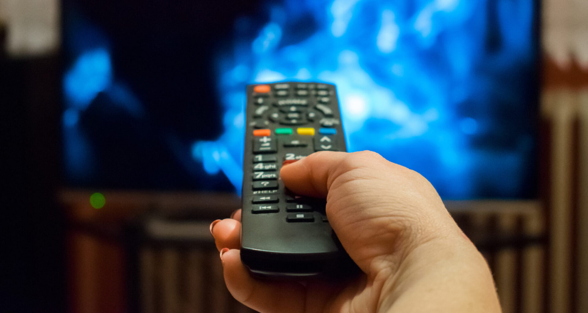 Watching tv and using remote control