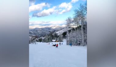 A deer narrowly misses a child skiing at Deer Valley Resort....