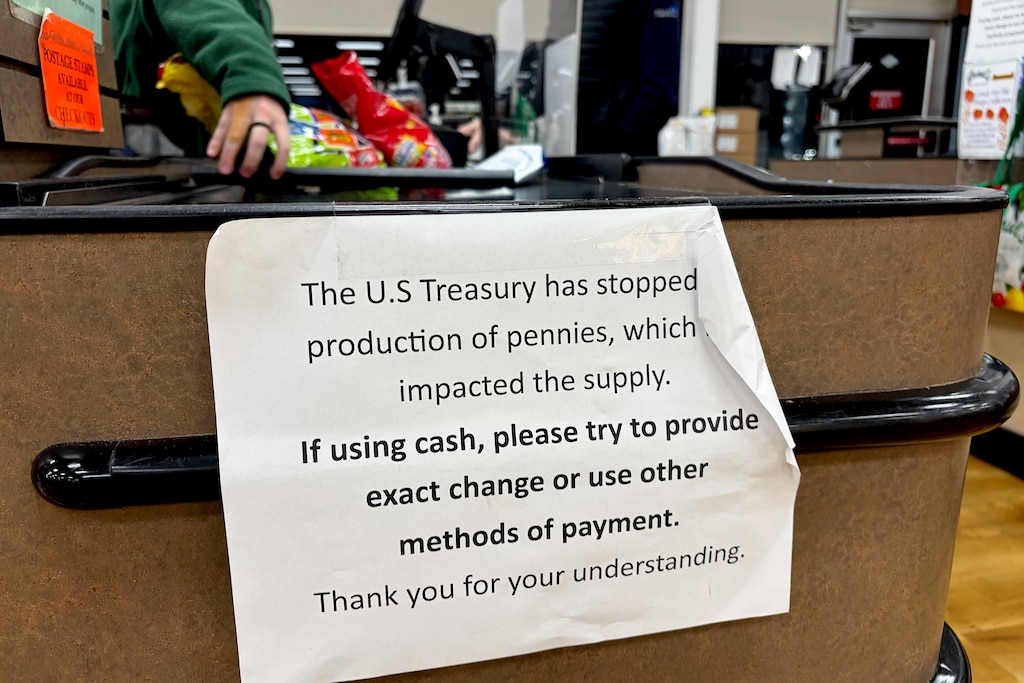 A sign at the register of Graul's Market.