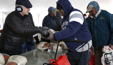 Cardinal Cupich joins parish for Thanksgiving food giveaway - Photos