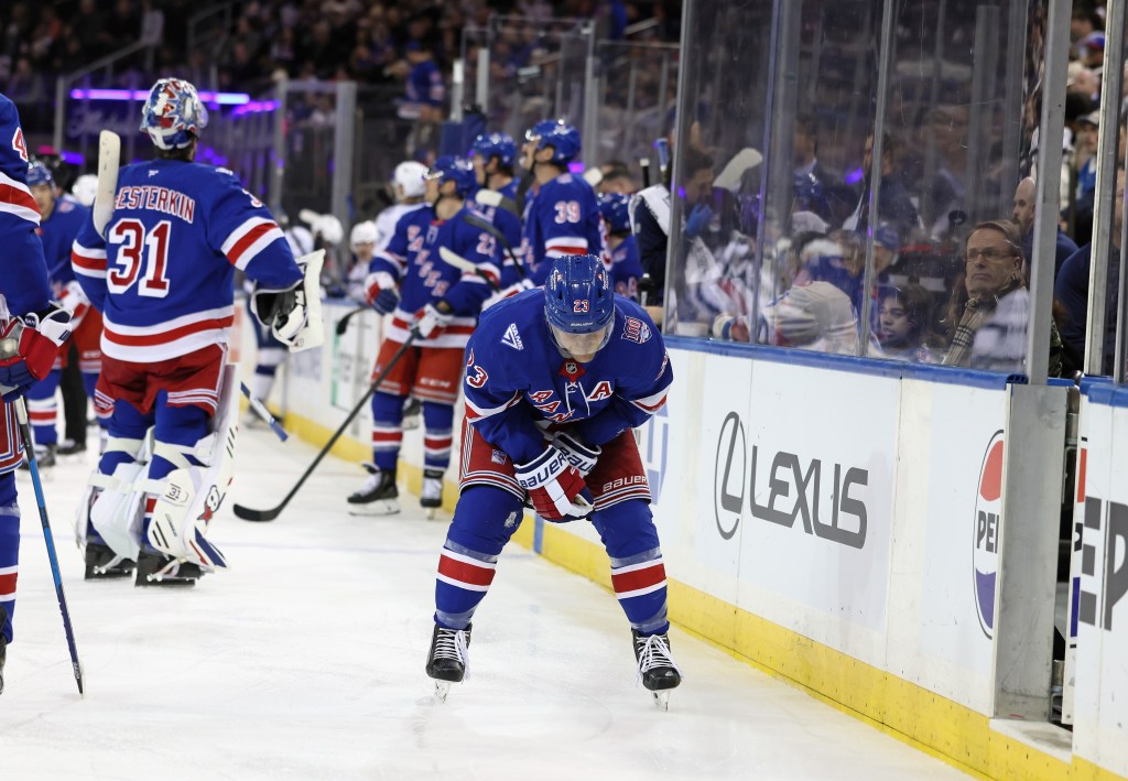 Adam Fox of the New York Rangers injured during the third period.