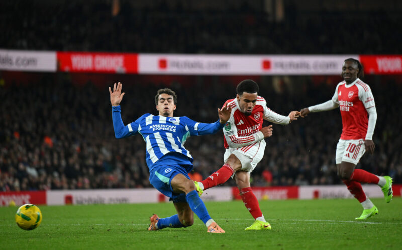 LONDON, ENGLAND - OCTOBER 29: Ethan Nwaneri of Arsenal scores his team's first goal as Yasin Ayari of Brighton & Hove Albion fails to block his...