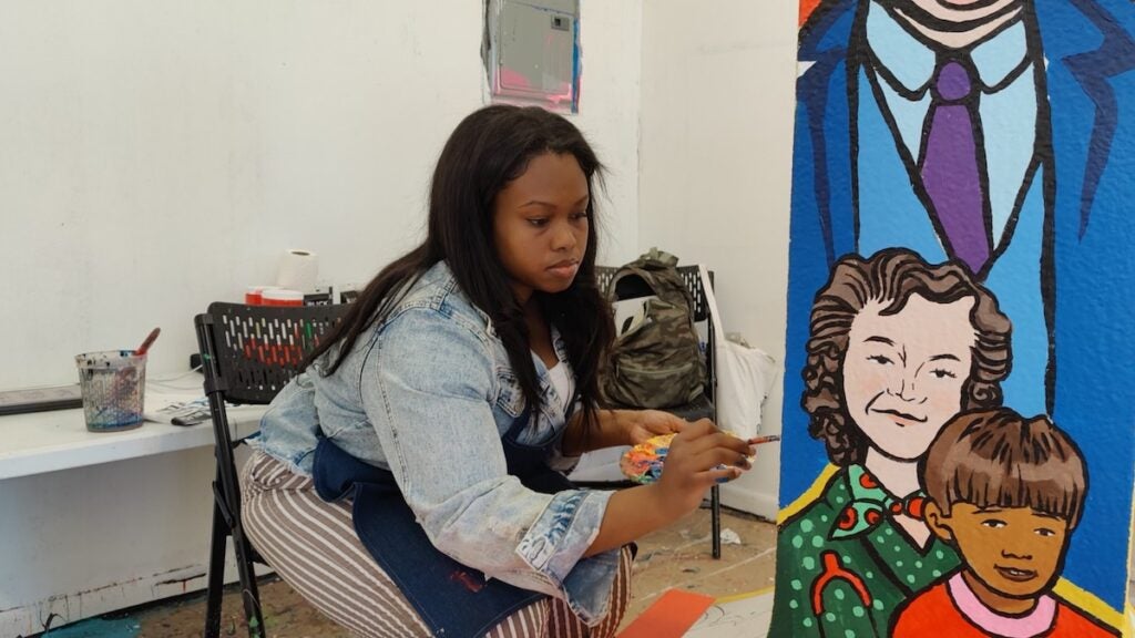 Alana Saxmore paints co-creators of ronald mcdonald house