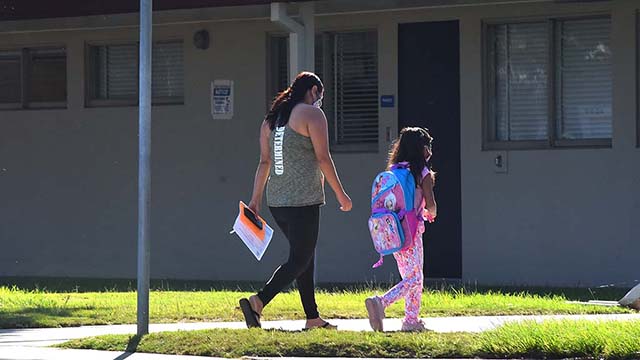 Children went back to the classroom in San Diego Unified School District as part of Phase One to help special needs students. The girl is returning to Lafayette Elementary School in Clairemont.