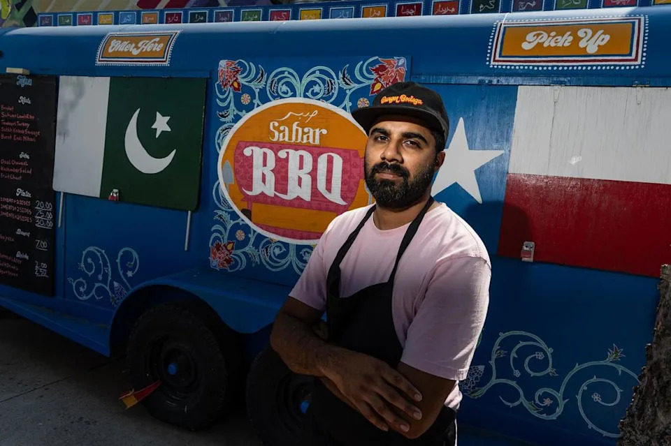 Zain Shafi, the owner of Sabar BBQ, is photographed at his barbecue trailer parked at the corner of East Vickery Boulevard and South Main Street near downtown Fort Worth. 