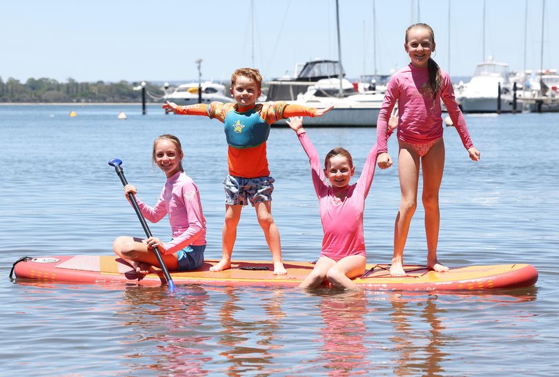 Siblings Makaela (10), Lewis (4) Chelsea (7) and Tara (9) Thornton are enjoying the sunshine on Matilda Bay.