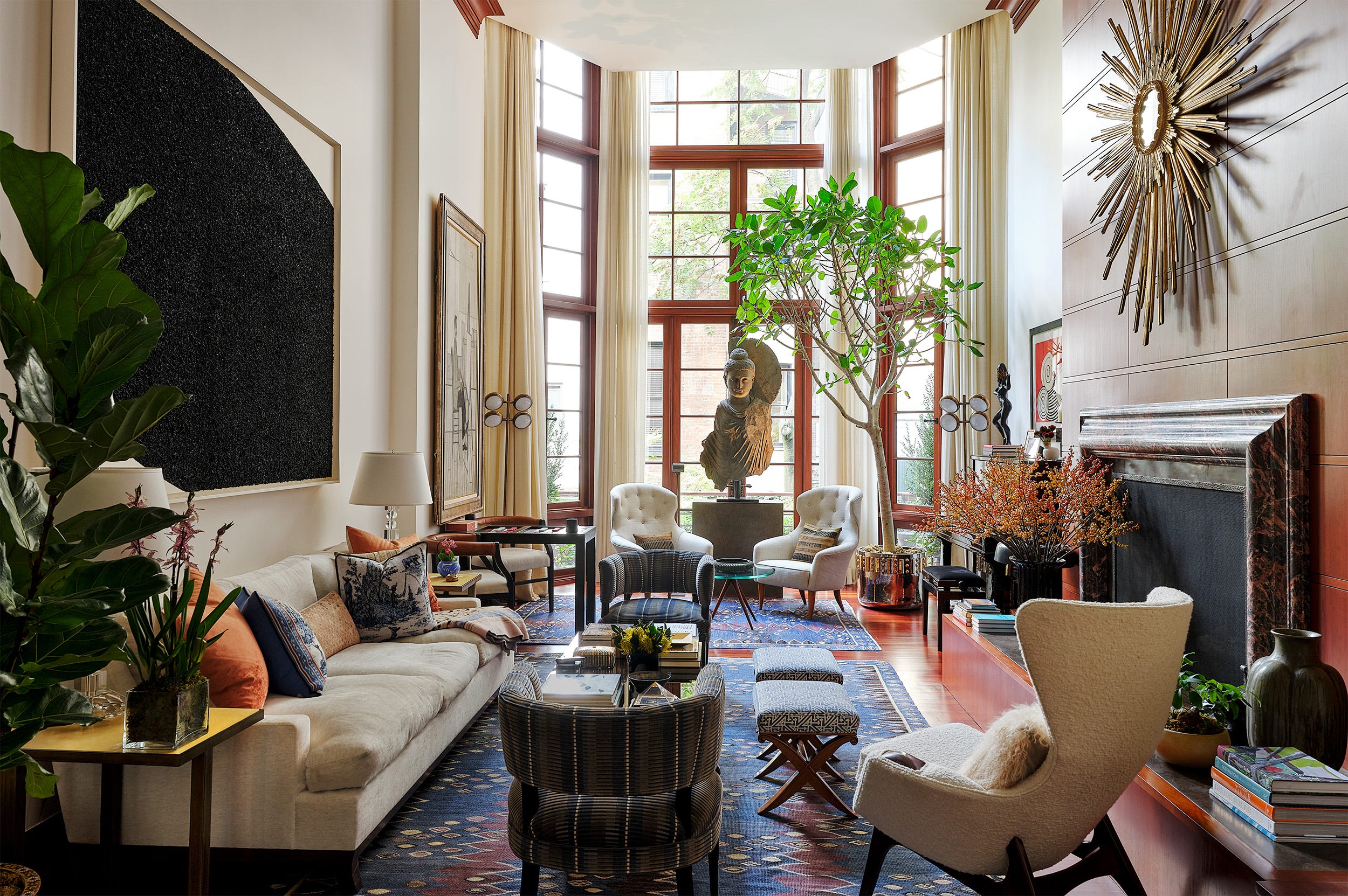 Spacious living room featuring modern decor and natural elements.