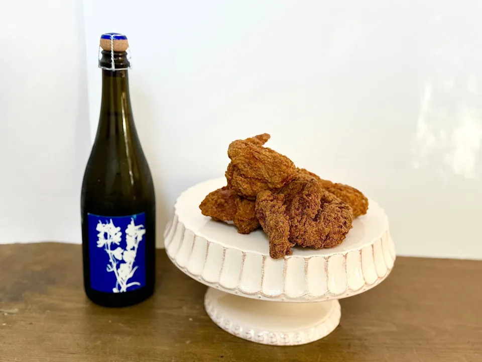 Fried chicken from Tallyrand in Burbank paired with a bottle of Delphinium California Cremant