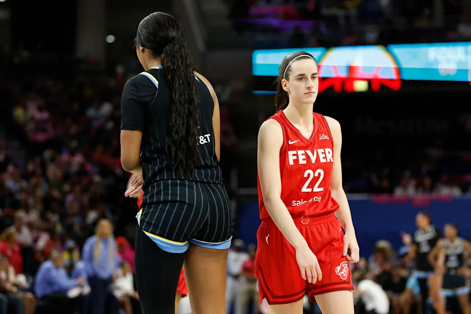 Indiana Fever guard Caitlin Clark (22) and Chicago Sky forward Angel Reese (5)Kamil Krzaczynski-Imagn Images