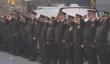 Philadelphia police escort body of Officer Andy Chan to headquarters: "An absolute legend in our department"