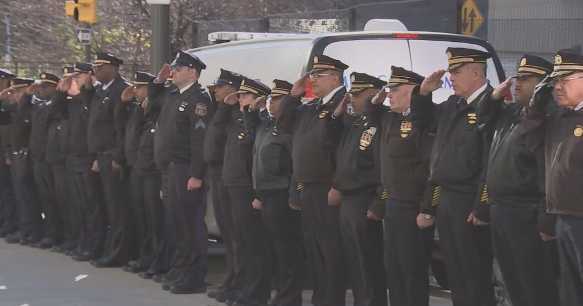 Philadelphia police escort body of Officer Andy Chan to headquarters: "An absolute legend in our department"