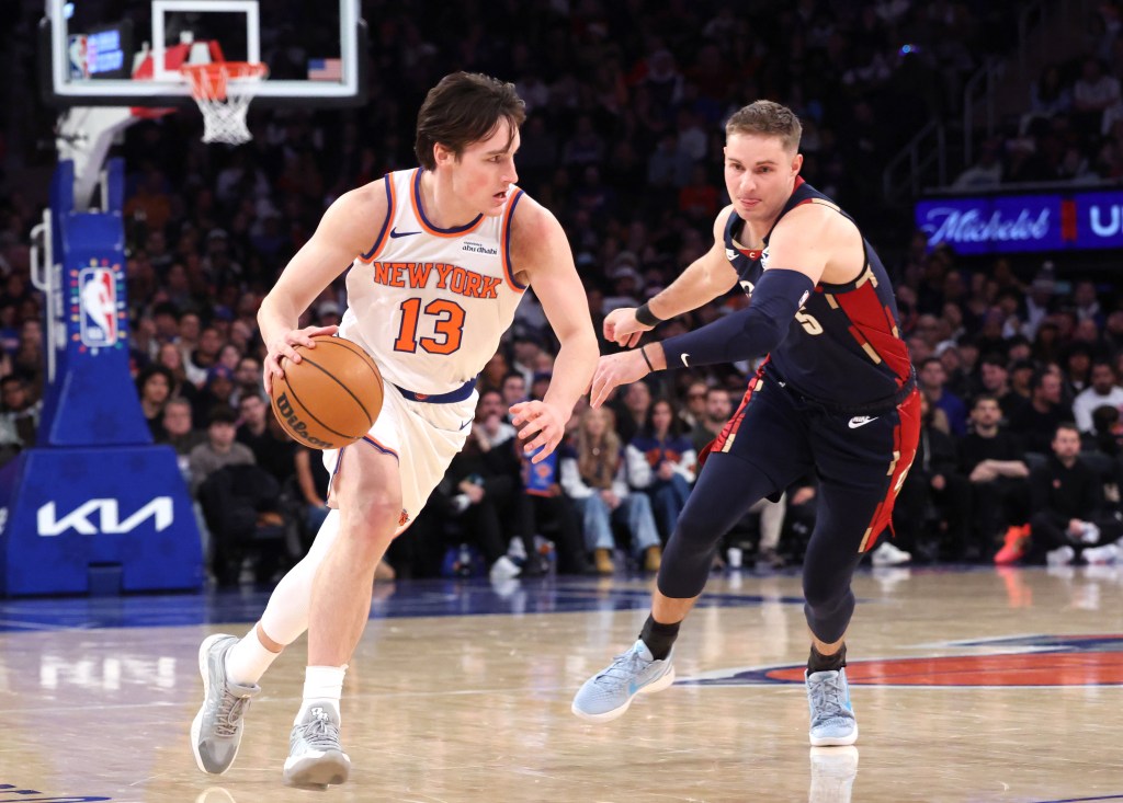 Tyler Kolek (13) drives up the court during the Knicks' win over the Cavaliers on Dec. 25, 2025.