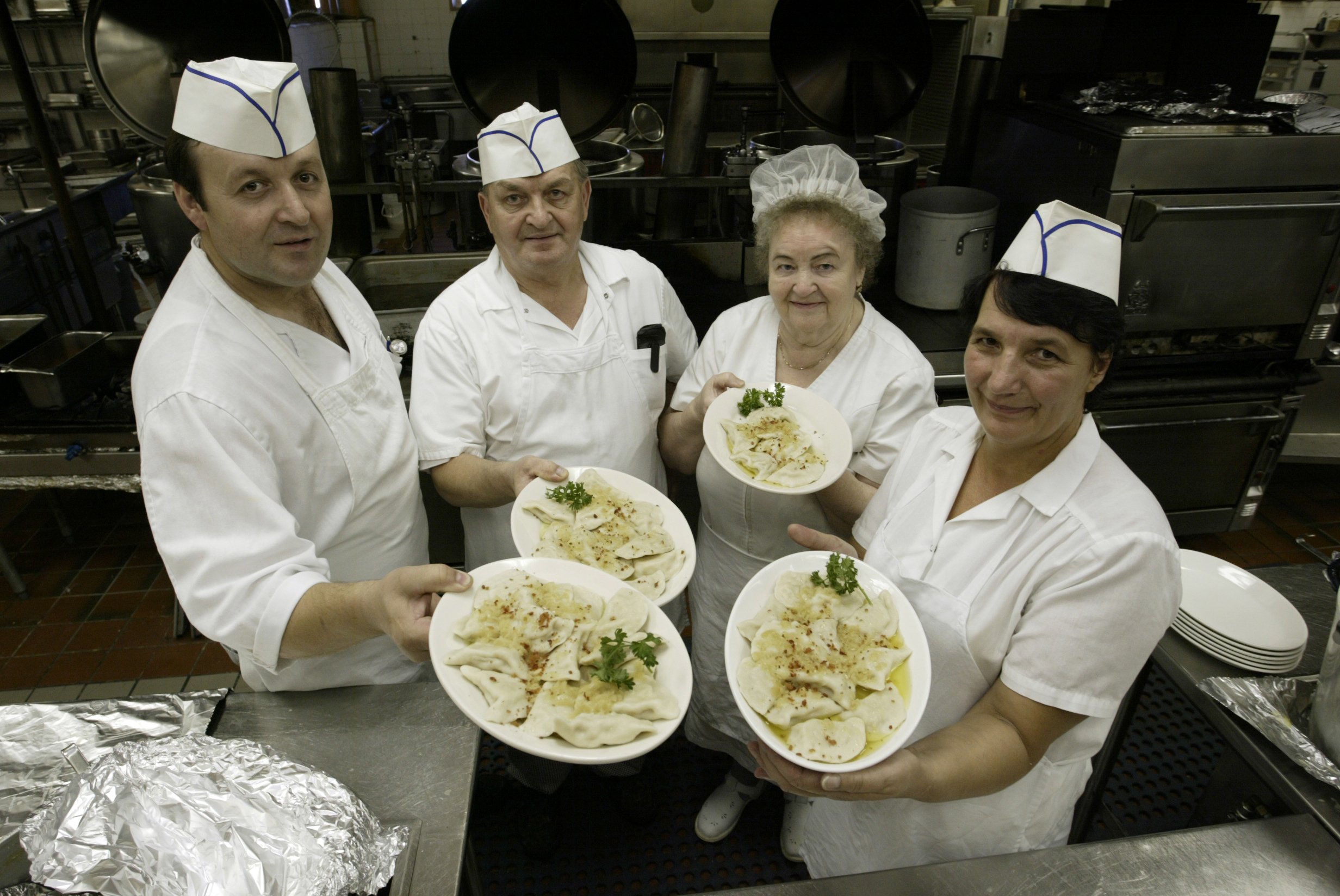White Eagle cooks Adem Spaijoski, from left, Jan Gaszynski, Zofia...