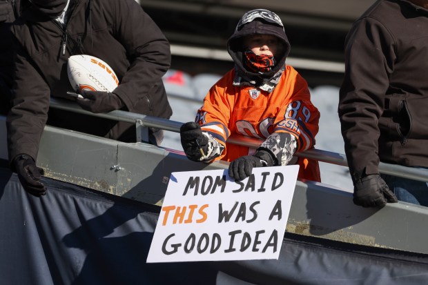 Bears fans watch their team warm up to face the Browns on Sunday, Dec. 14, 2025, at Soldier Field. (Brian Cassella/Chicago Tribune)