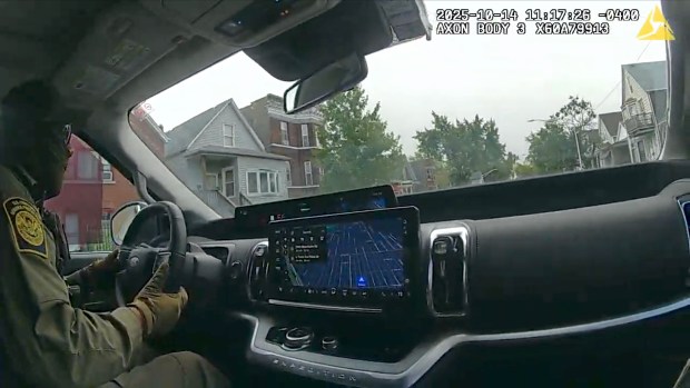 A body camera worn by a federal agent captures, from inside the government's rental SUV, parts of an 18-minute vehicle chase around an East Side neighborhood on Oct. 14, 2025. The chase ended when the agent driving the SUV purposely crashed into the suspects' vehicle and sent it careening across an intersection into a parked car, while the force launched the air bags in the agents' SUV. (Loevy & Loevy)