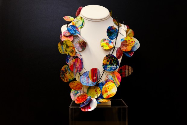 The Chicago Architecture Center's multicolored Kinetics Necklace ($168.95) has handmade paper designs by Takara Beatheagudell. (Emmelly Aldave, Chicago Architecture Center)