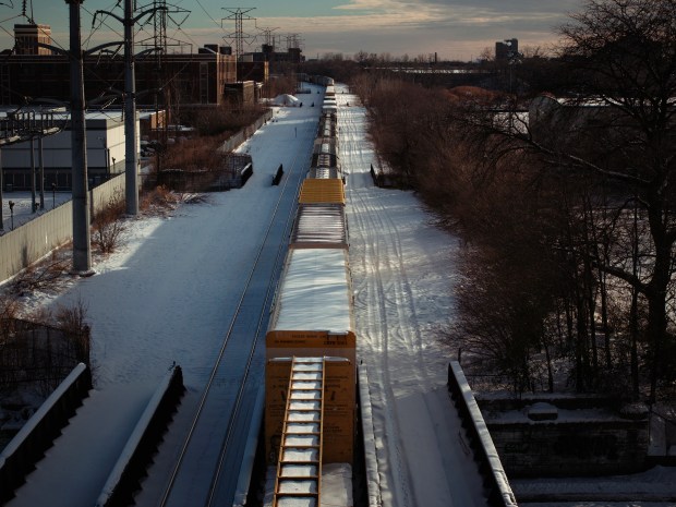 A Union Pacific train moves north through the Garfield Park neighborhood on Dec. 8, 2025. (E. Jason Wambsgans/Chicago Tribune)