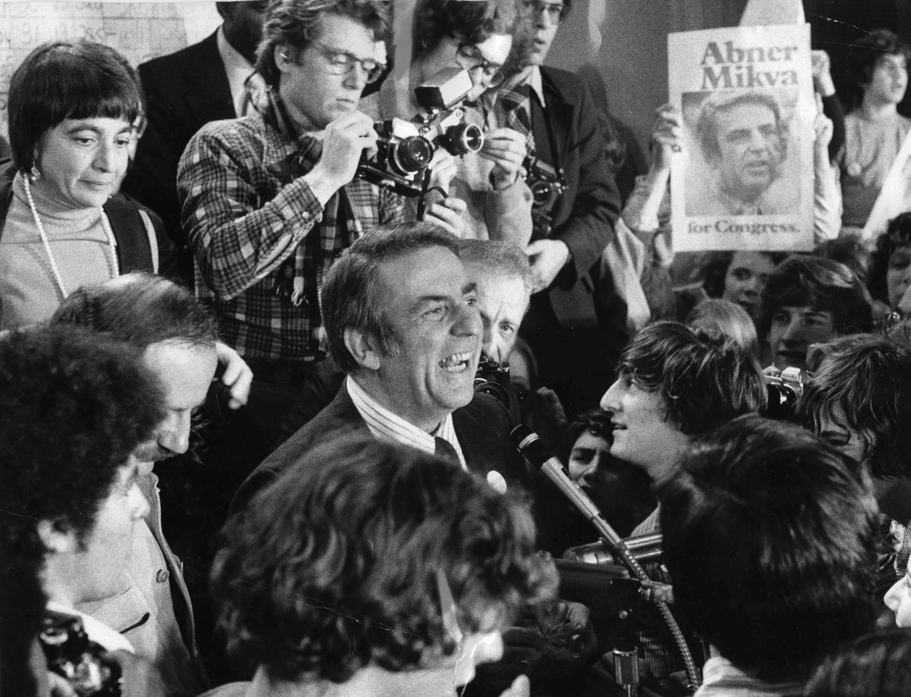 Abner Mikva celebrates his win over U.S. Rep.Â Samuel H. Young...