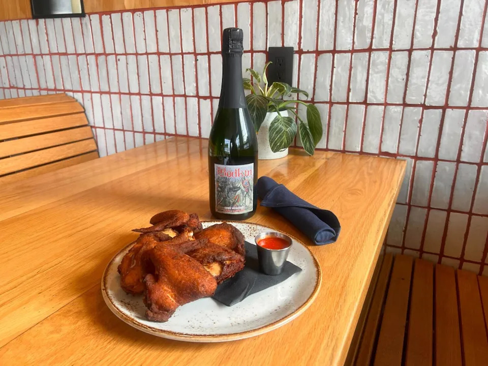 Fried chicken from Alta restaurant with a bottle of Bodkin Wines "Cuvée Agincourt."