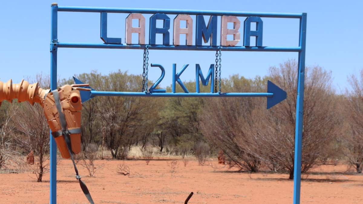 Arrest made a day after the alleged stabbing death of a man in remote Northern Territory town Laramba