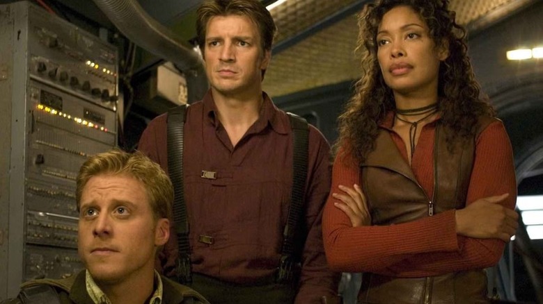Captain Malcolm (Nathan Fillion) and the crew of Serenity in Firefly