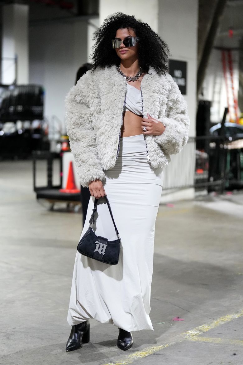 Rae Burrell of the Los Angeles Sparks arrives at the arena before a game against the New York Liberty.