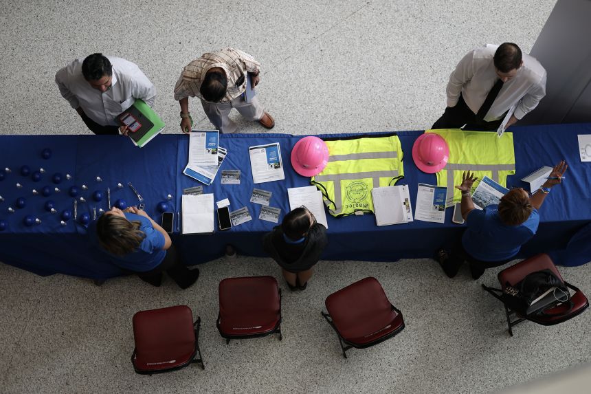 Job seekers at the Mega JobNewsUSA South Florida Job Fair in Sunrise, Florida, on September 25.