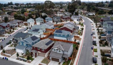 Home prices are poised to dip in 22 U.S. cities next year, a new analysis says. See where.