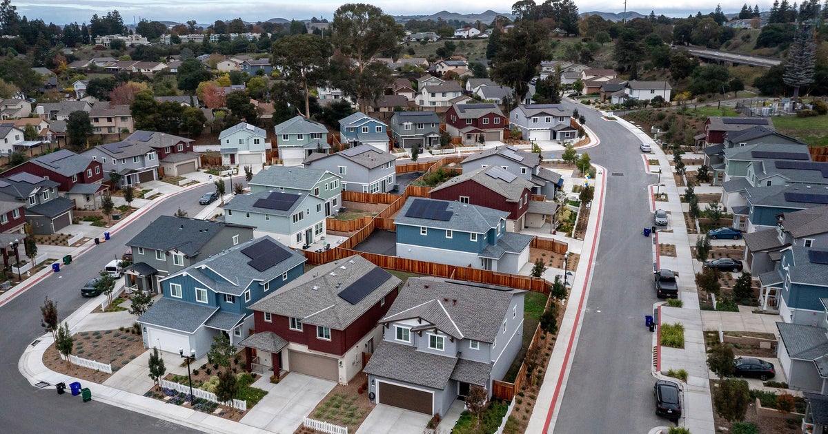 Home prices are poised to dip in 22 U.S. cities next year, a new analysis says. See where.