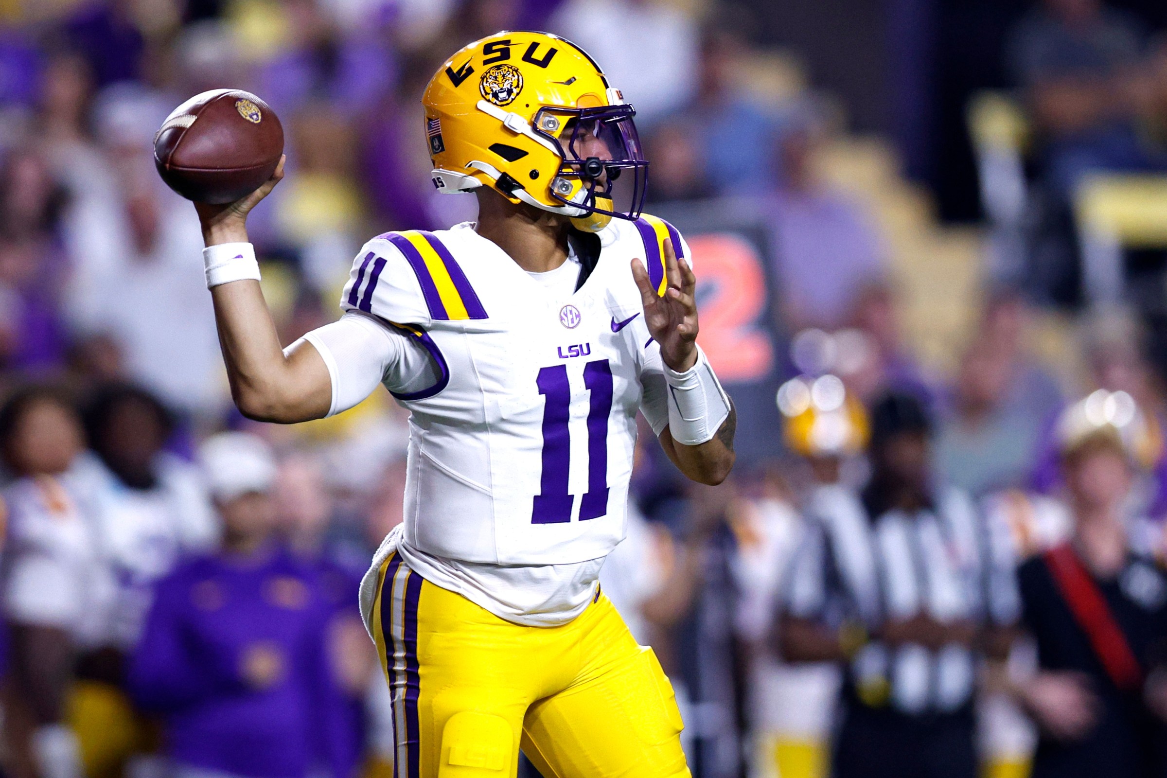 BATON ROUGE, LOUISIANA - NOVEMBER 22: Michael van Buren Jr. #11 of the LSU Tigers looks to pass during the first quarter of an NCAA football game against the Western Kentucky Hilltoppers at Tiger Stadium on November 22, 2025 in Baton Rouge, Louisiana. (Photo by Sean Gardner/Getty Images)
